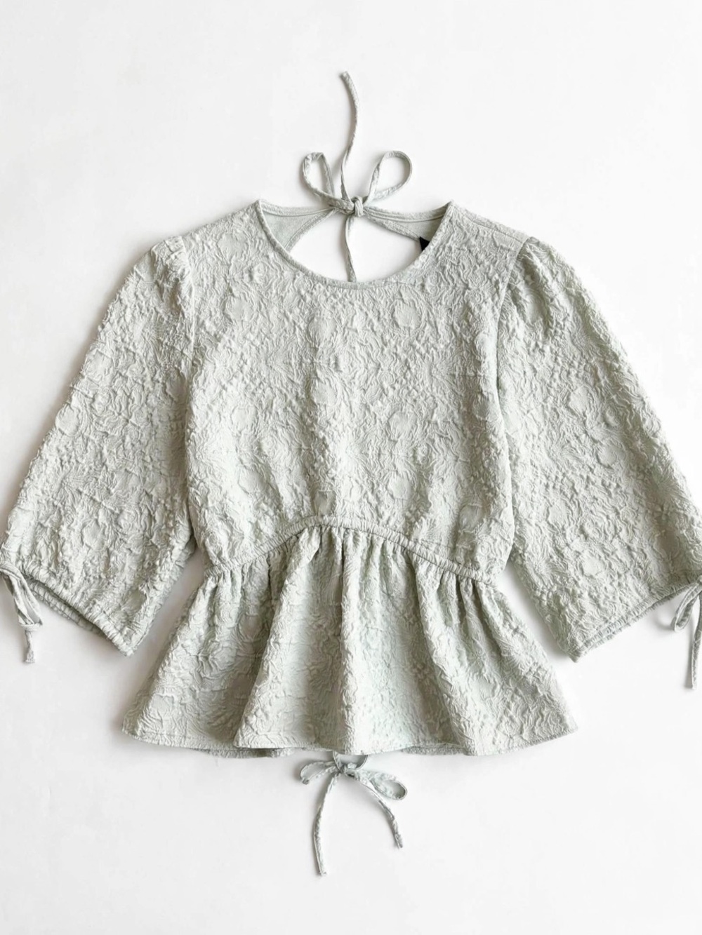 Zara textured blouse with open back